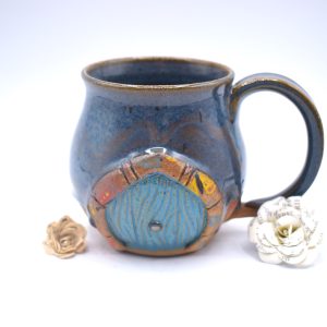 Blue hobbit door mug with floral wallpaper 18 oz