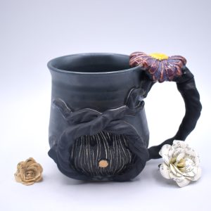 Haunted hobbit door mug with daisy 16 oz
